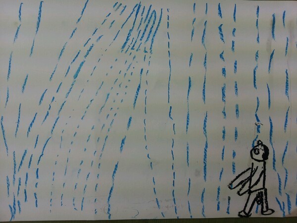 ▲틱장애 아동의 PITR(Person In The Rain: 빗속의 사람). 세차게 내리는 비를 피하지 못하고 맞고만 있는 벌거벗은                    남자 모습에 현재의 자기를 투영하고 있다. 필자 제공